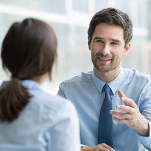 An agent talking to a coworker.