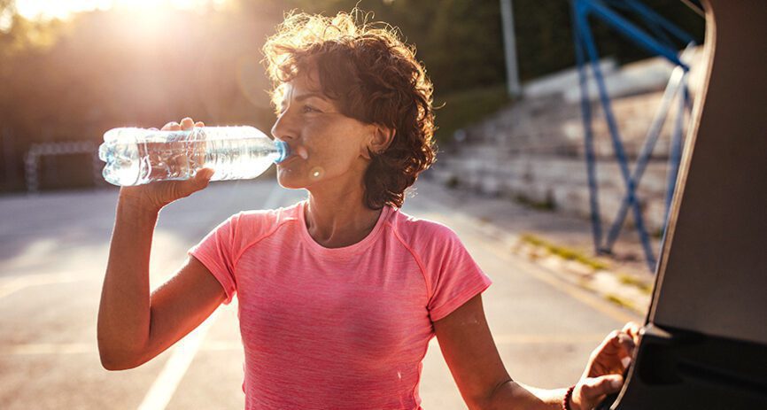 Healthy Women Drinking Bottled Water
