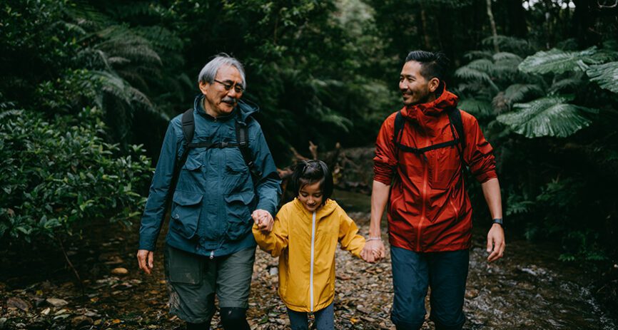 Family hiking together in the woods