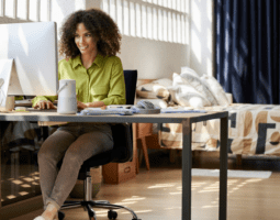 Woman working from home at computer