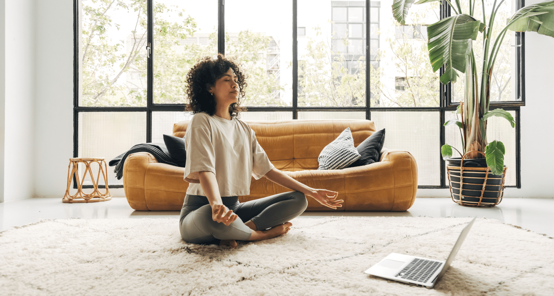 Woman taking virtual yoga meditation glass