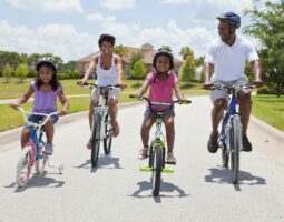 Young family riding bikes.