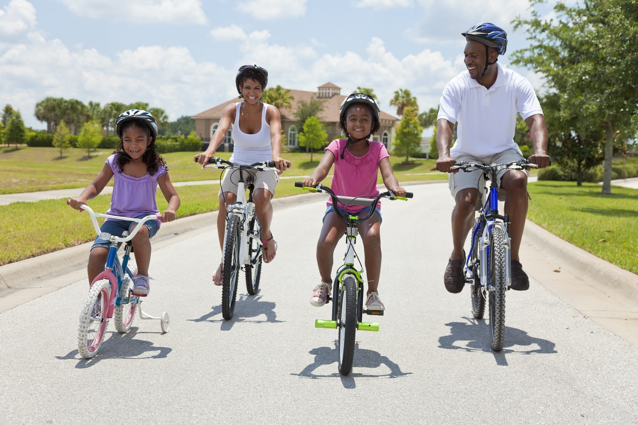 Young family riding bikes.